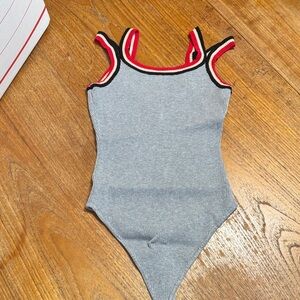 Rehab Gray Bodysuit with Red and Black Accents